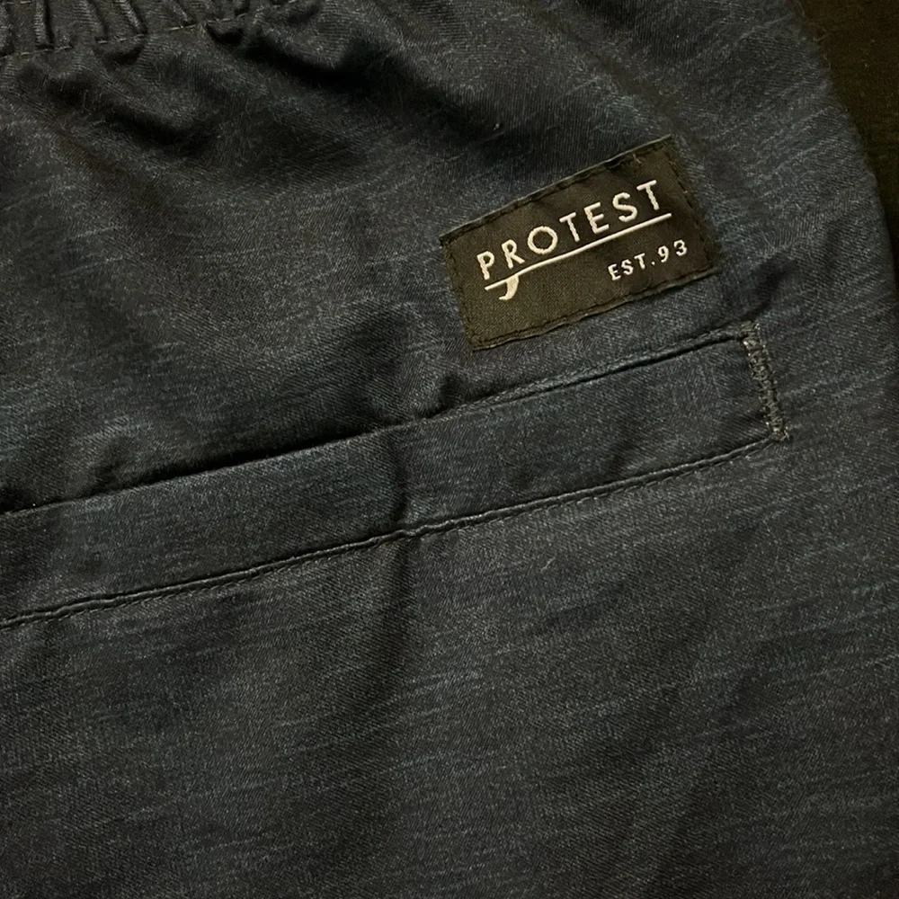 “Protest-Swim shorts size large”